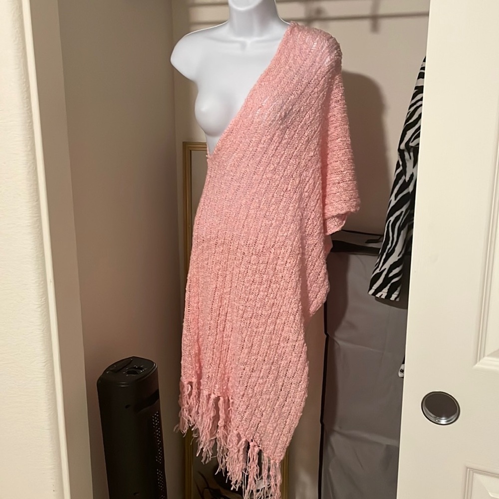 Pink poncho like accessory